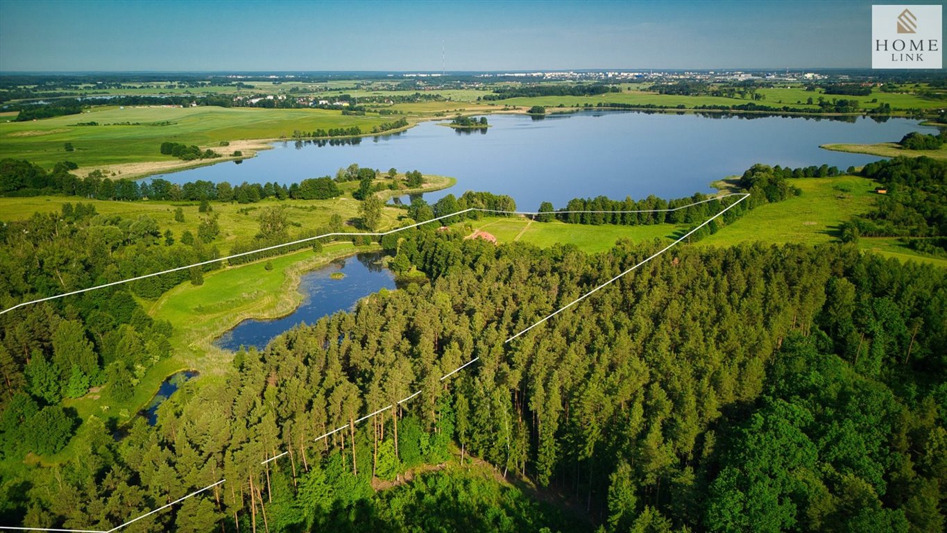 Unikalna posiadłość z linią brzegową jeziora i domem z bala Purda  112 551m2 Foto 1