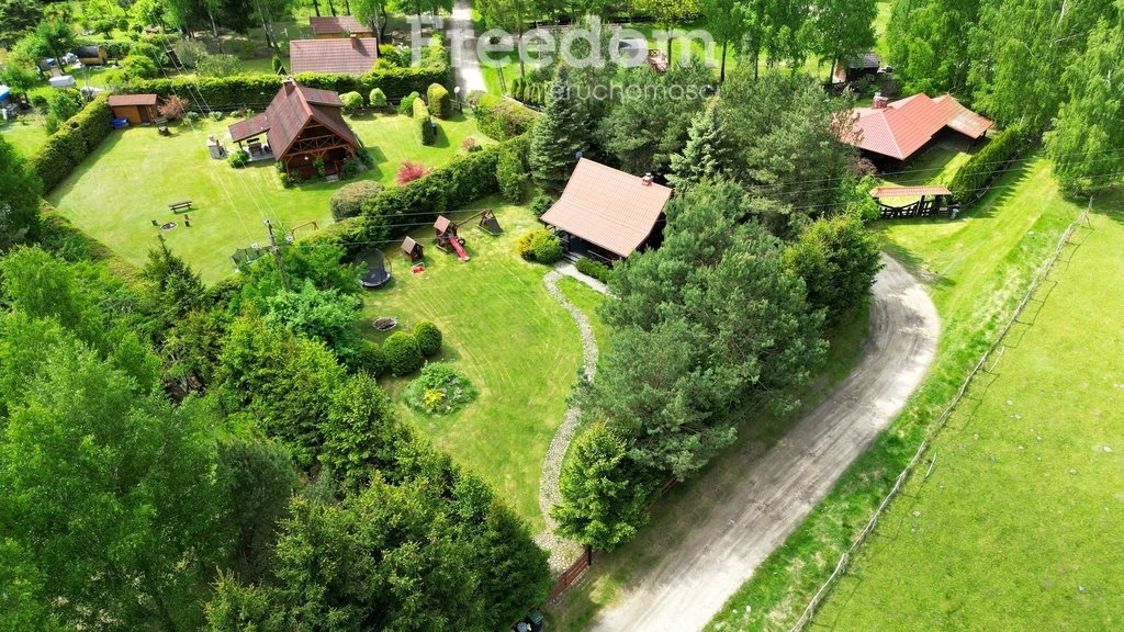 Sprzedam drewniany domek 56 m² z ogrodem w Murawkach Urowo, Murawki  56m2 Foto 1