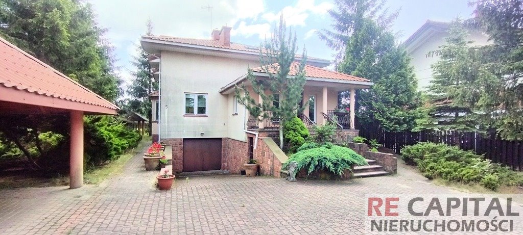Zapraszam do obejrzenia ekskluzywnego domu 254 m² z dębowymi elementami Stare Babice, Dworkowa  254m2 Foto 1