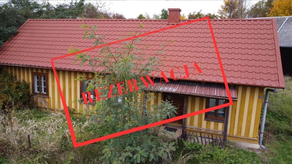 Urokliwy drewniany dom z lat 30 z dużymi budynkami gospodarczych Bolesław  73m2 Foto 1