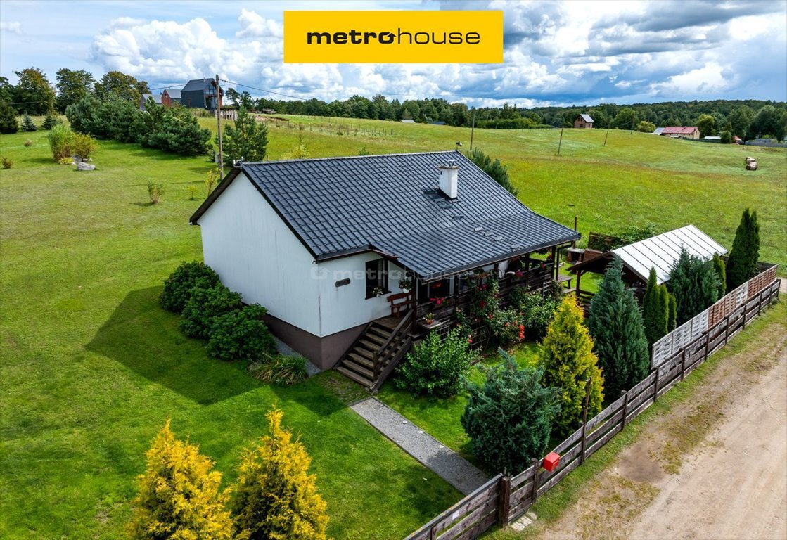 Zapraszam do domu z kominkiem, tarasem i dużą działką nad jeziorem Sople  73m2 Foto 1