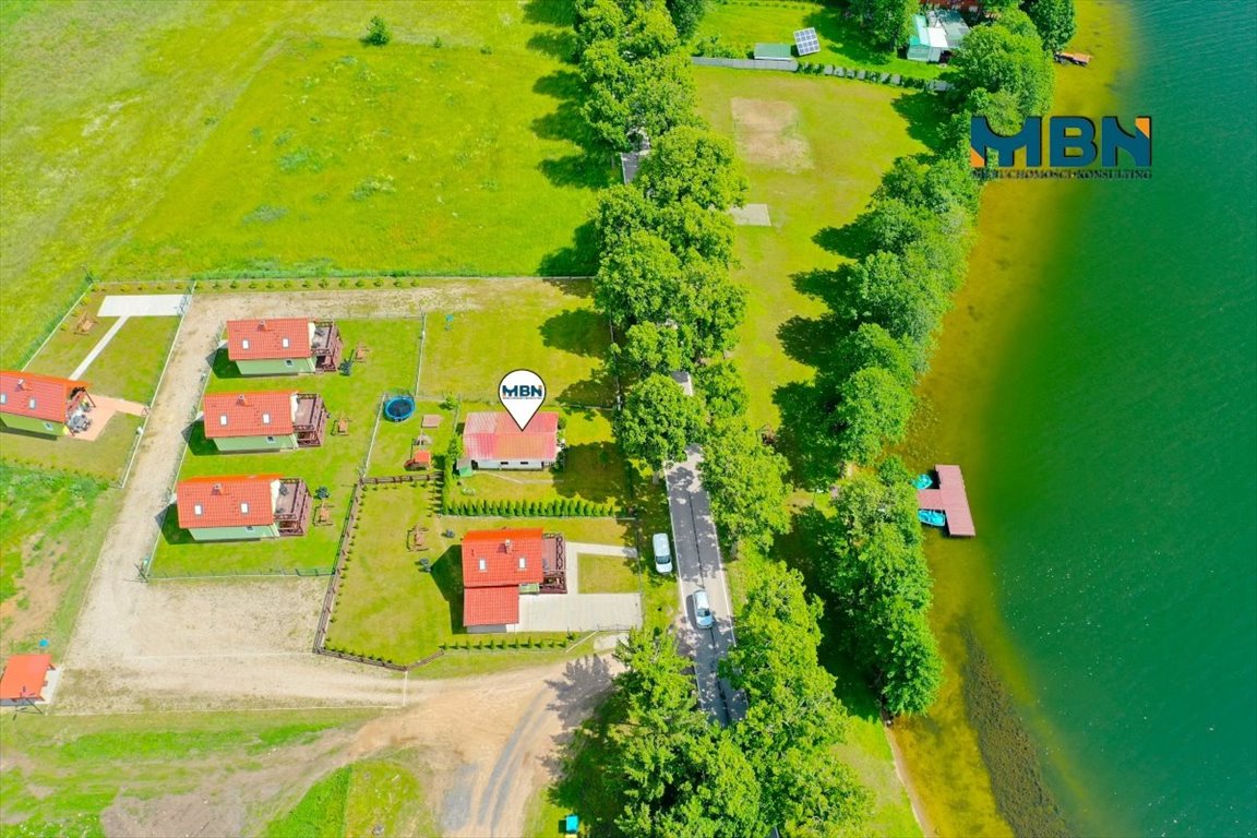 Do sprzedania urokliwy domek nad jeziorem z dużym tarasem Ryn, Prażmowo  41m2 Foto 1
