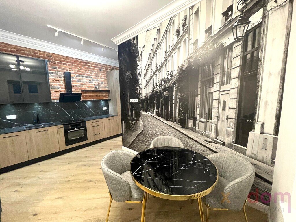 Stylowe loftowe mieszkanie 50 m² z parkingiem na Pl. Wolności Kielce, pl. Wolności  50m2 Foto 1