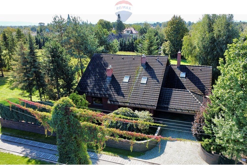 Przestronny dom z ogrodem zimowym i garażem w Piasku Piasek  170m2 Foto 1