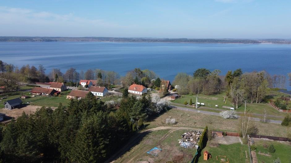 Działka z widokiem na jezioro, projekt domu, media Jeziorowskie  993m2 Foto 1