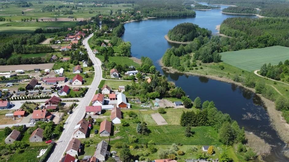 Działka nad jeziorem z zabudową i linią 16m Sucholaski  1 864m2 Foto 1