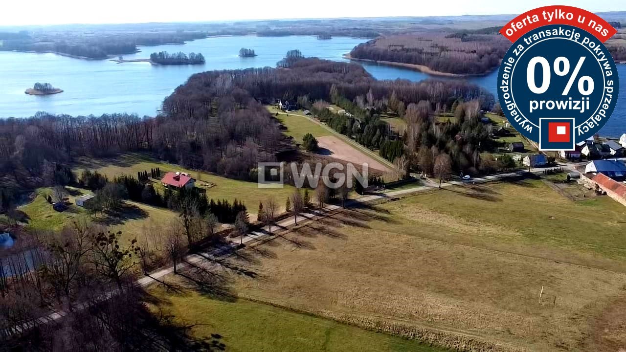 Działka blisko jeziora z dostępem do wody i uzbrojeniem Rożyńsk  1 271m2 Foto 1