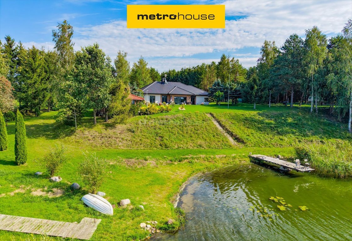 Zapraszam do domu nad jeziorem z 56 m linii brzegowej, 5 pokoi, taras, garaż: Giże