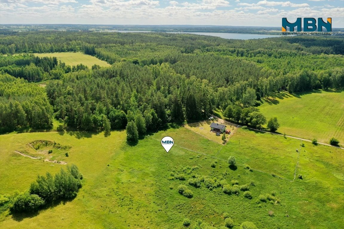 Działka budowlana 3001 m² pod lasem nad jeziorami Mazurskimi Giżycko, Kamionki  3 001m2 Foto 1