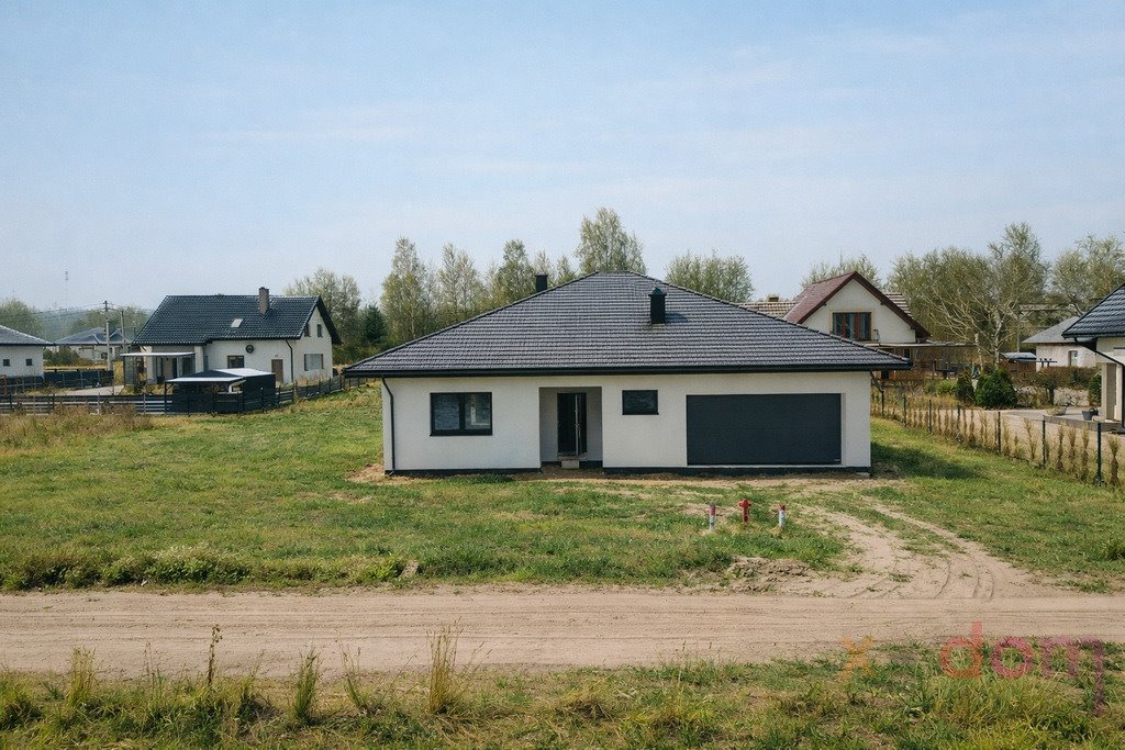Dom wolnostojący w stanie surowym z garażem i dużą działką Tumlin-Wykień  166m2 Foto 1
