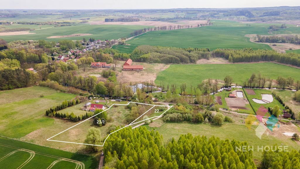 Urokliwa działka z widokiem na jezioro i rzekę Potryty  8 861m2 Foto 1