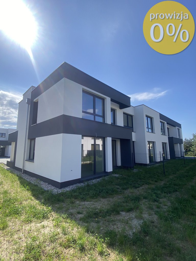 Sprzedam nowoczesny segment narożny z ogródkiem w Lake Village Nowa Wola  112m2 Foto 1