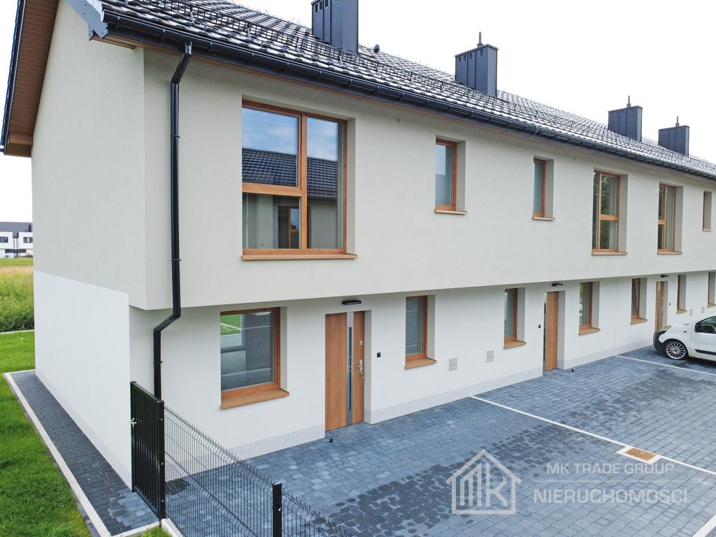 Nowe dwupoziomowe mieszkanie 84 m² z ogródkiem i miejscami zapraszam Niepołomice  84m2 Foto 1