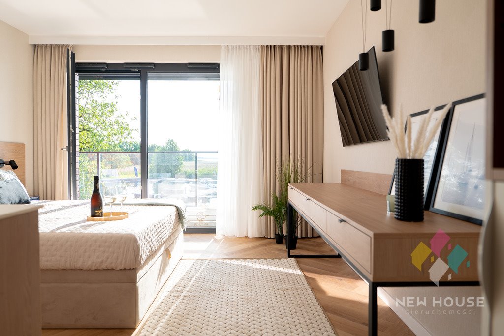 Apartament nad jeziorem w Port 69 z dostępem do plaży Ogonki, Sztynorcka  25m2 Foto 1