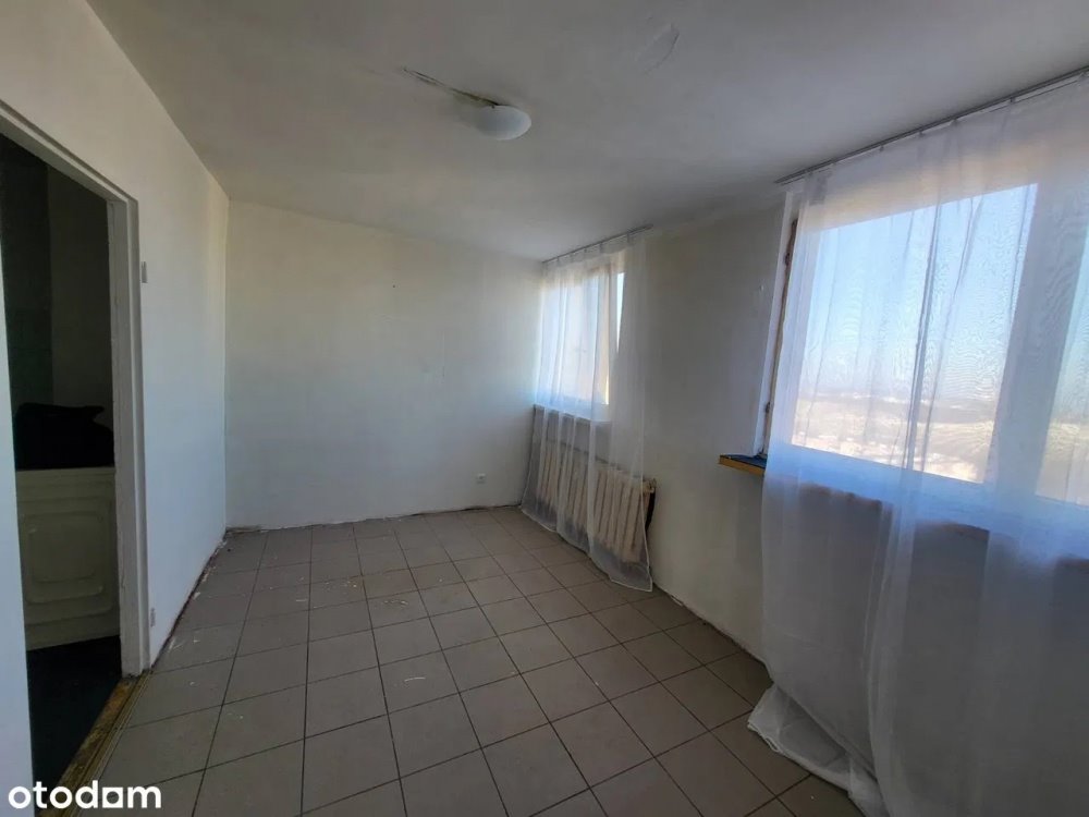 Atrakcyjna kawalerka do remontu na 11. piętrze w Opolu Wrocław  20m2 Foto 1