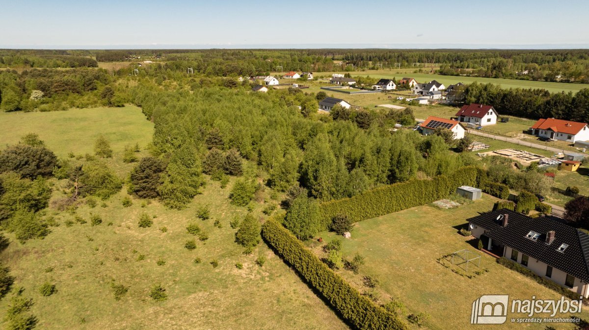 Działka pod zabudowę w Białuniu, 35 tys. m2, media przy drodze Białuń, wieś  34 951m2 Foto 1