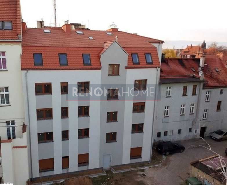 Kamienica z mieszkaniami i lokalami usługowymi w centrum Legnicy Legnica  1 290m2 Foto 1