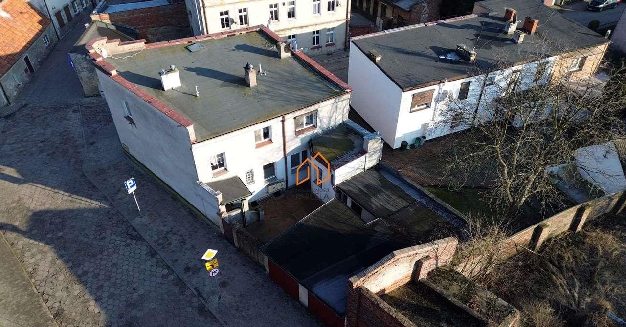 Przestronne 95 m² z garażem i podwórkiem w centrum Śrem, Ogrodowa  95m2 Foto 1