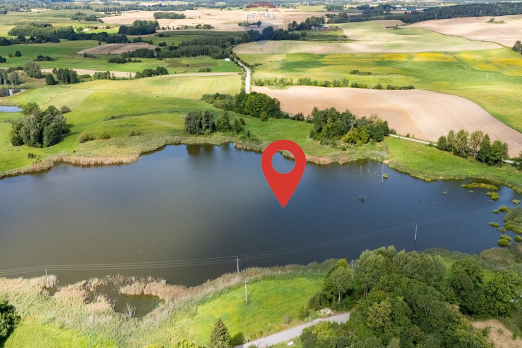 Działka z linią brzegową jeziora – inwestycja na Mazurach Giżycko  34 400m2 Foto 1