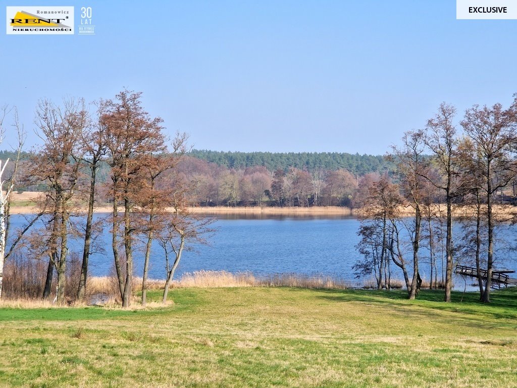 Działka nad jeziorem z widokiem i dostępem do plaży Stary Klukom  1 516m2 Foto 1