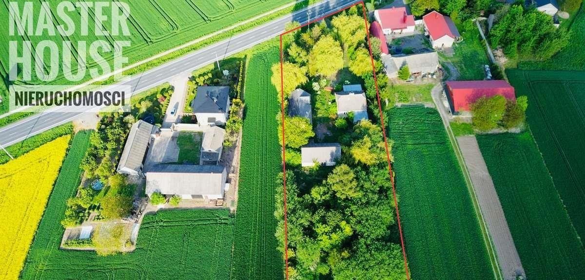 Działka z domem i budynkami przy DK9 – potencjał! Sadowie  80m2 Foto 1