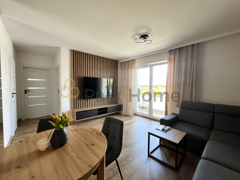 Zapraszam do obejrzenia nowoczesnego 54,63 m² mieszkania z balkonem i garażem Kąkolewo  55m2 Foto 1