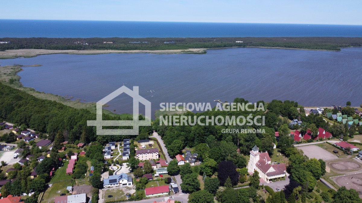 Do sprzedania ośrodek wypoczynkowy nad jeziorem z 14 domkami Nowęcin  400m2 Foto 1