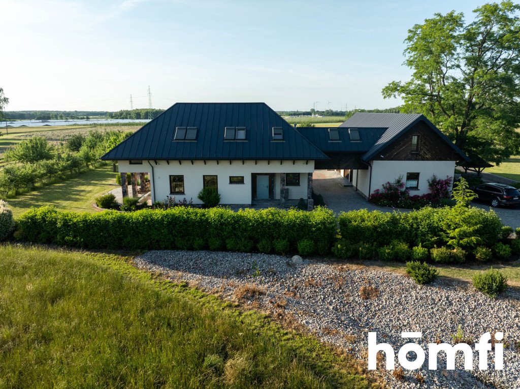 Zapraszam do obejrzenia domu z ogrodem, kortem i oczkami wodnymi Gąba, Brzozowa  355m2 Foto 1