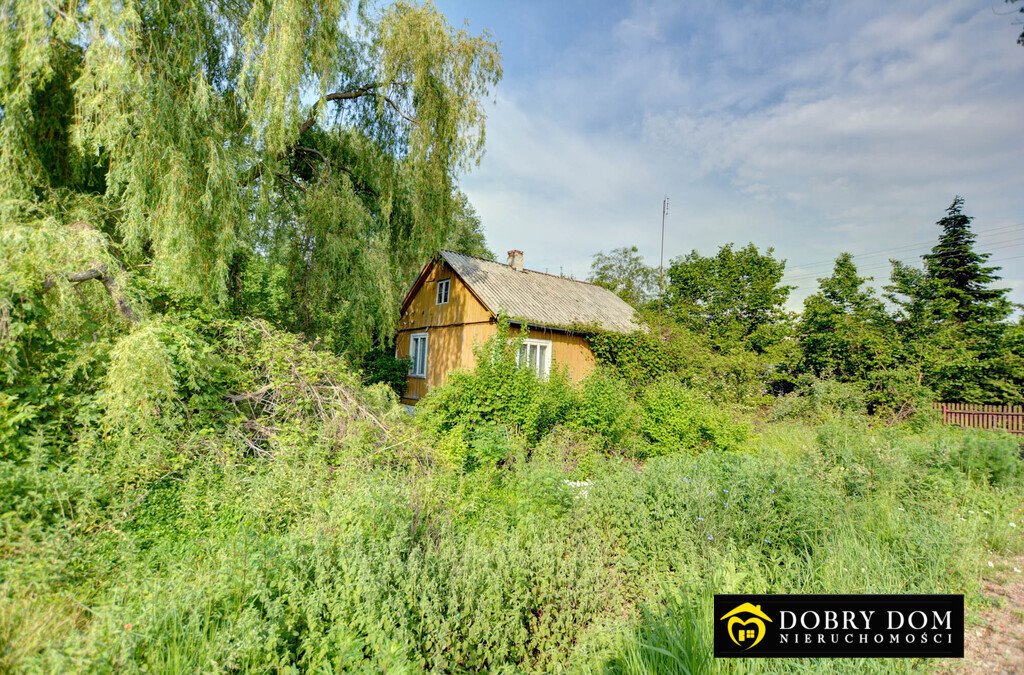 Zapraszam do obejrzenia drewnianego domu na 2 ha z lasem i zabudowaniami Sytki  60m2 Foto 1