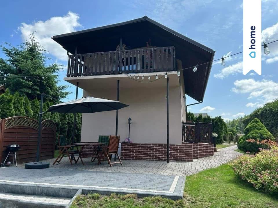Zapraszam do obejrzenia domu z tarasem i kominkiem nad jeziorem Sulnówko  70m2 Foto 1