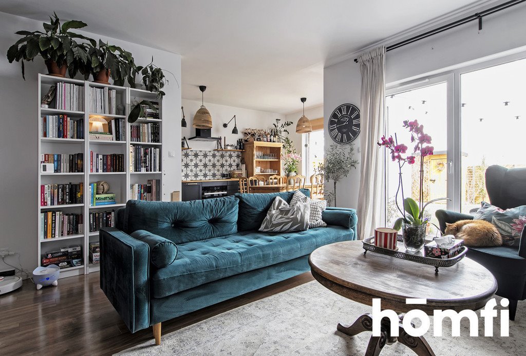 Jasne, oto propozycja tytułu zgodnie z wytycznymi:

"Przestronne 3-pokojowe mieszkanie z ogródkiem w Dopiewcu Dopiewiec  75m2 Foto 1