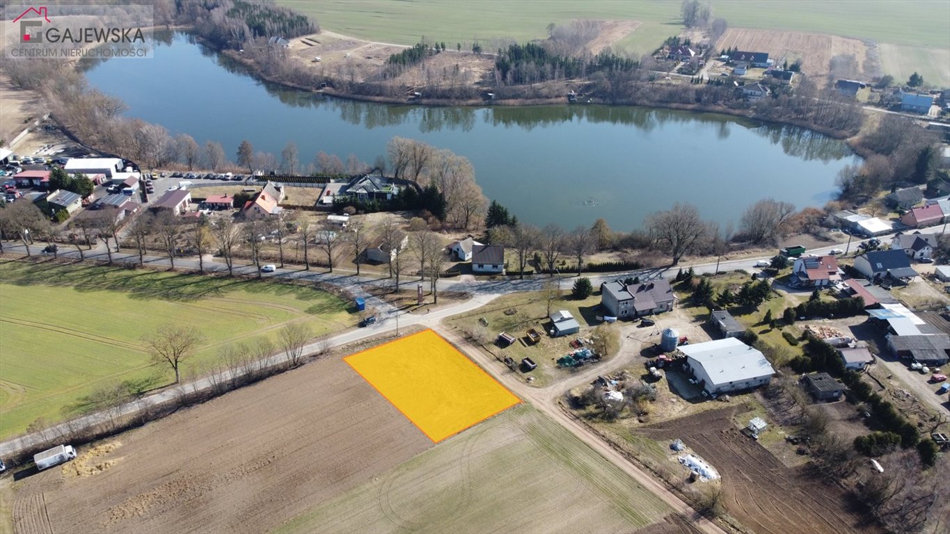 Działka budowlana 1300 m² z warunkami zabudowy, blisko jeziora Dobino  1 300m2 Foto 1