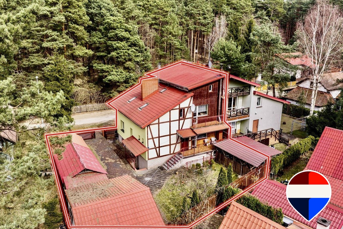 Dom nad jeziorem z dodatkowymi domkami i garażem Lubiatów, Wrzosowa 42  226m2 Foto 1
