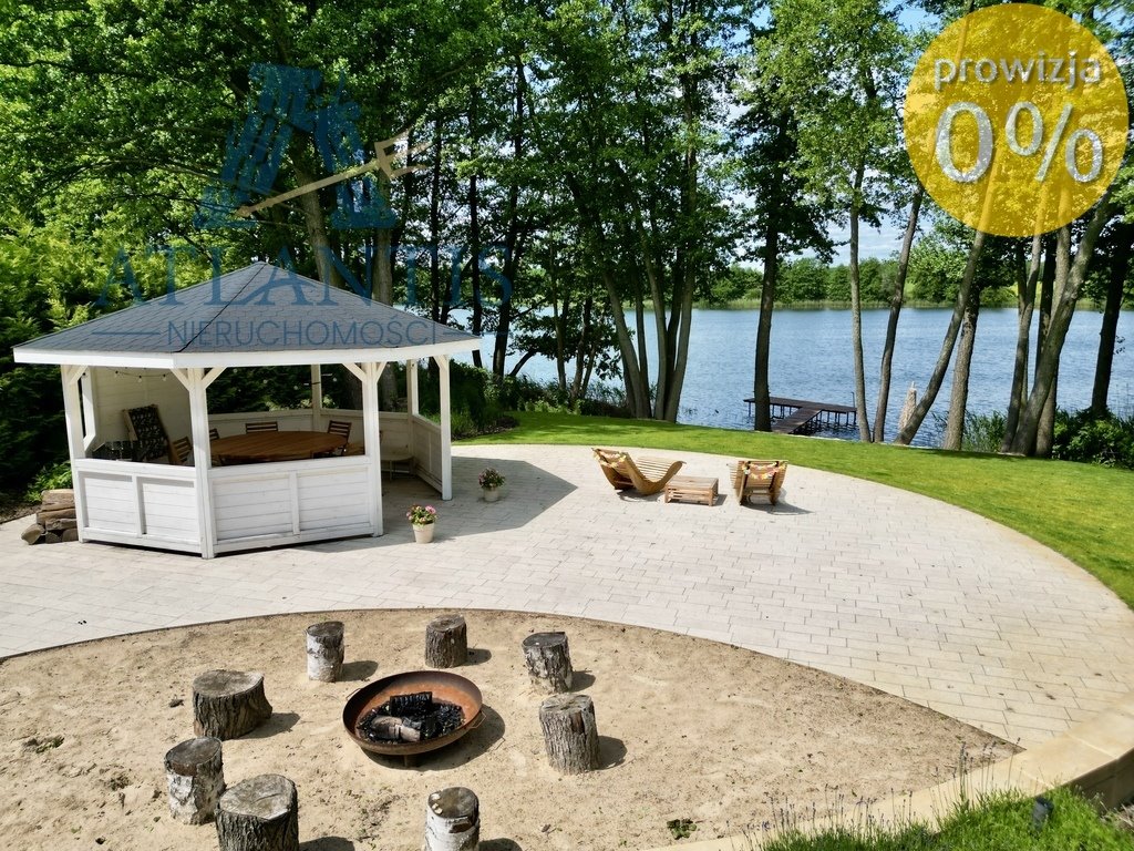 Urokliwy dom z jeziorem, garażami i dużą działką Świekatowo  196m2 Foto 1