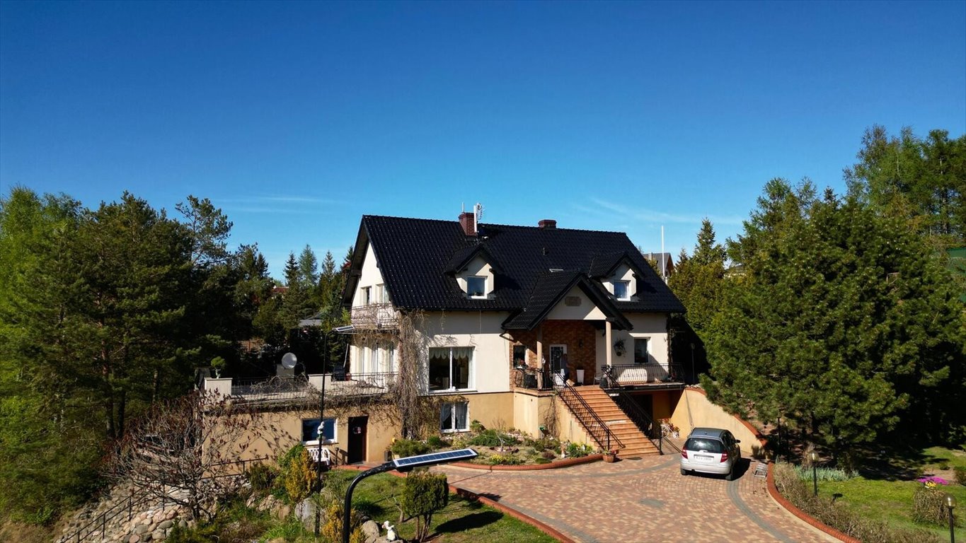 Inwestycja turystyczna z domkami i rekreacją 17 500 m² Tuchom, Tęczowa 16  352m2 Foto 1