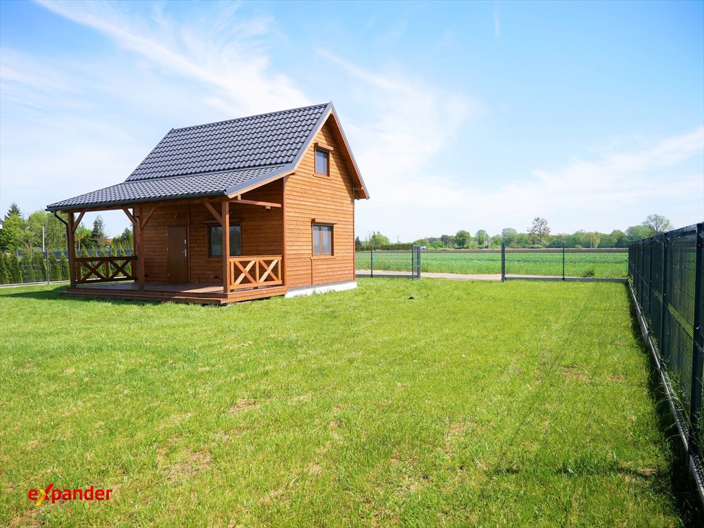 Urokliwy dom drewniany 70 m2 z garażem i dużą działką Powidz  70m2 Foto 1