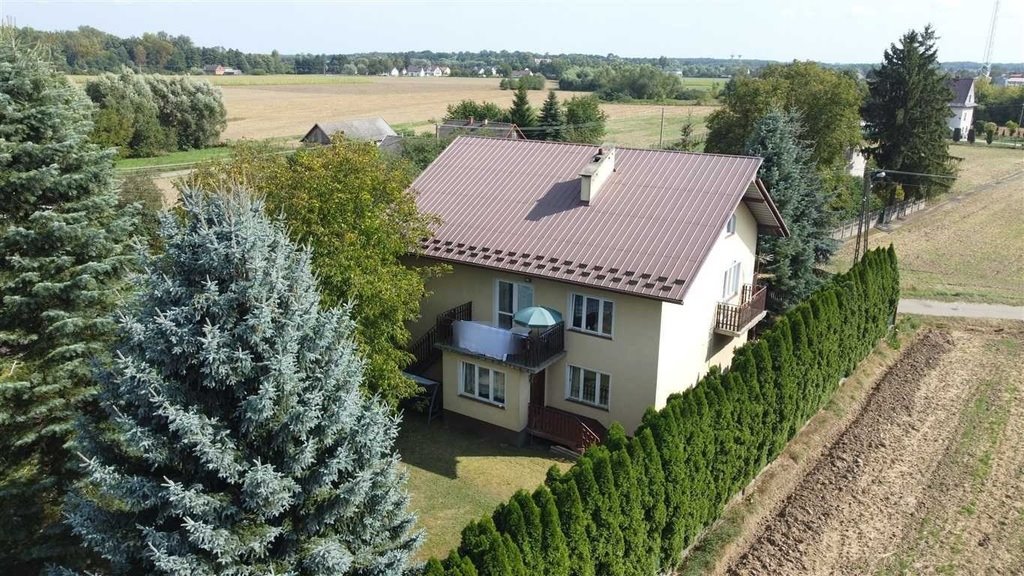 Polecam solidny dom 220m2 z garażem i tarasem w Szczucinie Szczucin  220m2 Foto 1