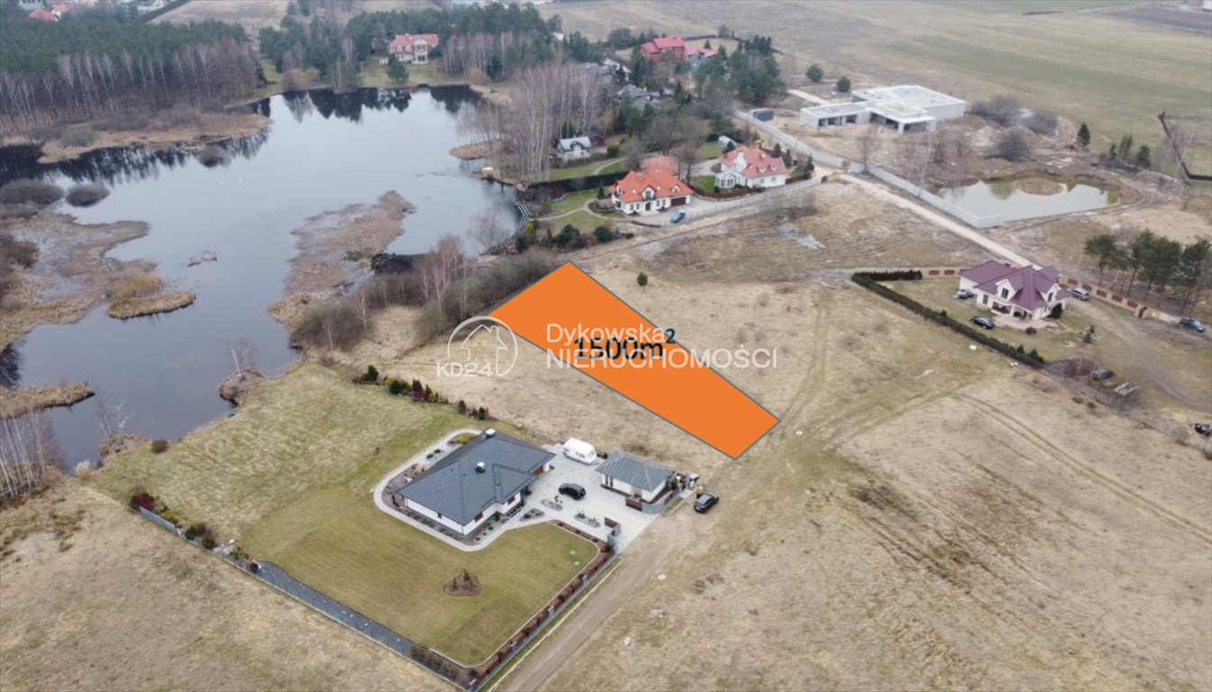 Do sprzedania działka 1500 m² nad jeziorem z mediami i utwardzonym dojazdem Lubowidz  1 500m2 Foto 1