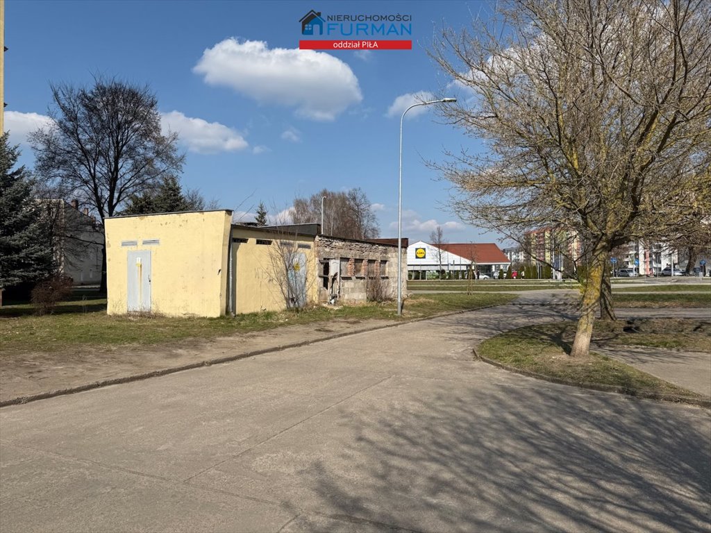 Sprzedam działkę z budynkiem pod działalność w Piła Zamość Piła, Zamość  486m2 Foto 1