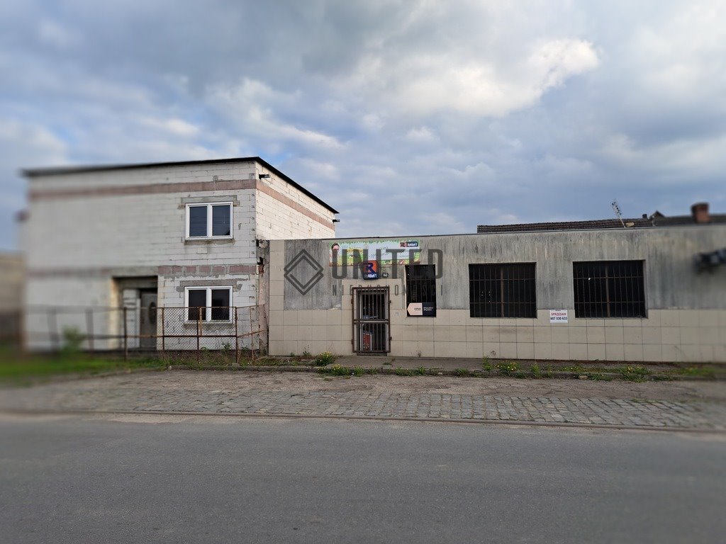 Magazyn i dom w stanie surowym w centrum Domaniów Domaniów  466m2 Foto 1