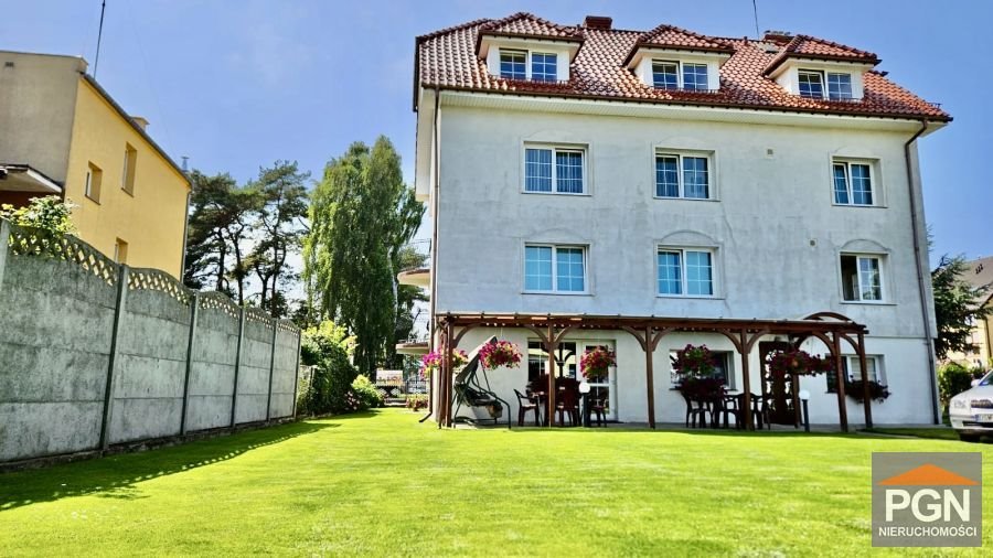 Dom z pokojami na wynajem, 19 pokoi, ogrzewanie, blisko plaży Pobierowo, Wojska Polskiego  420m2 Foto 1