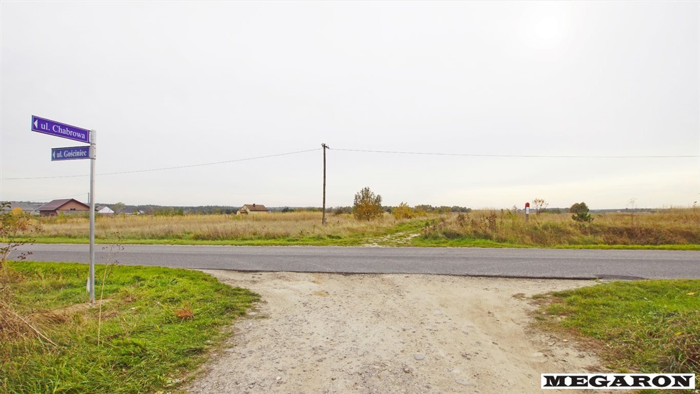 Działka budowlana z mediami, szer. 27 m, pod dom i usługi Ostrowy nad Okszą  1 658m2 Foto 1