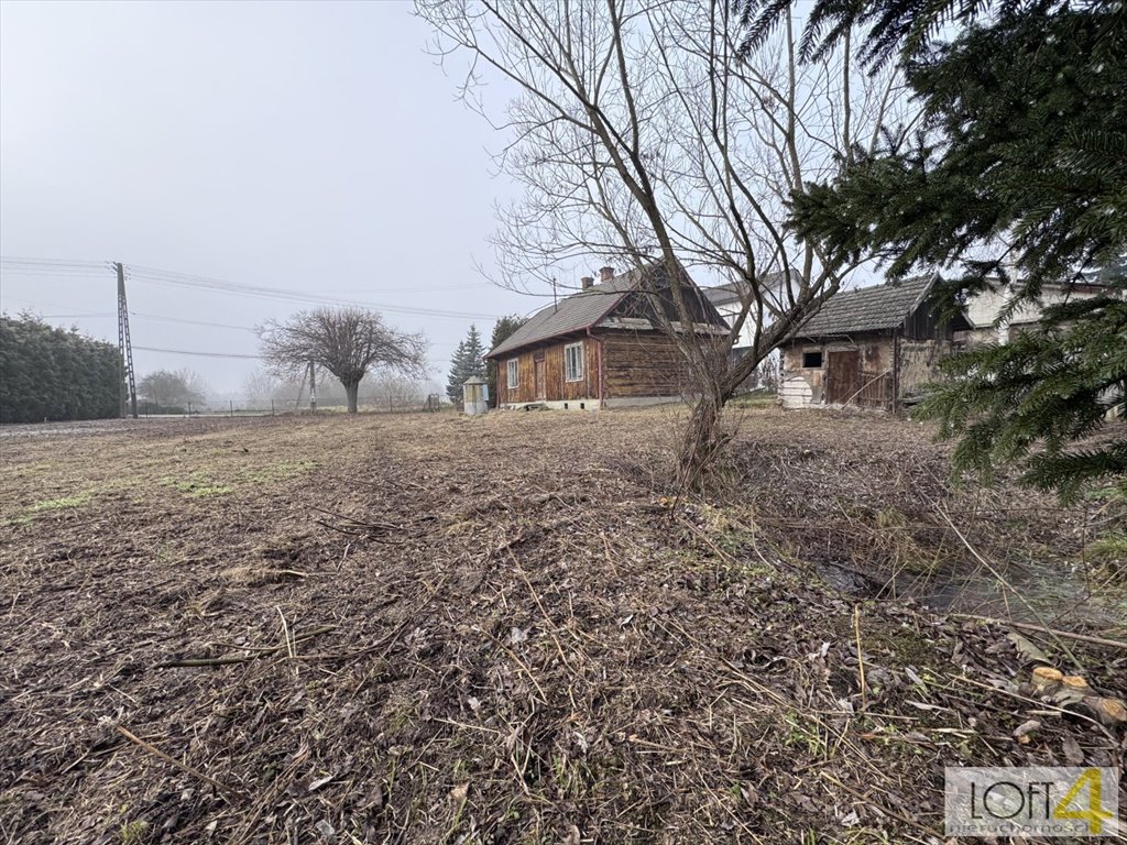 Zapraszam do obejrzenia drewnianego domu do remontu na dużej działce 17 arów Łęki  80m2 Foto 1