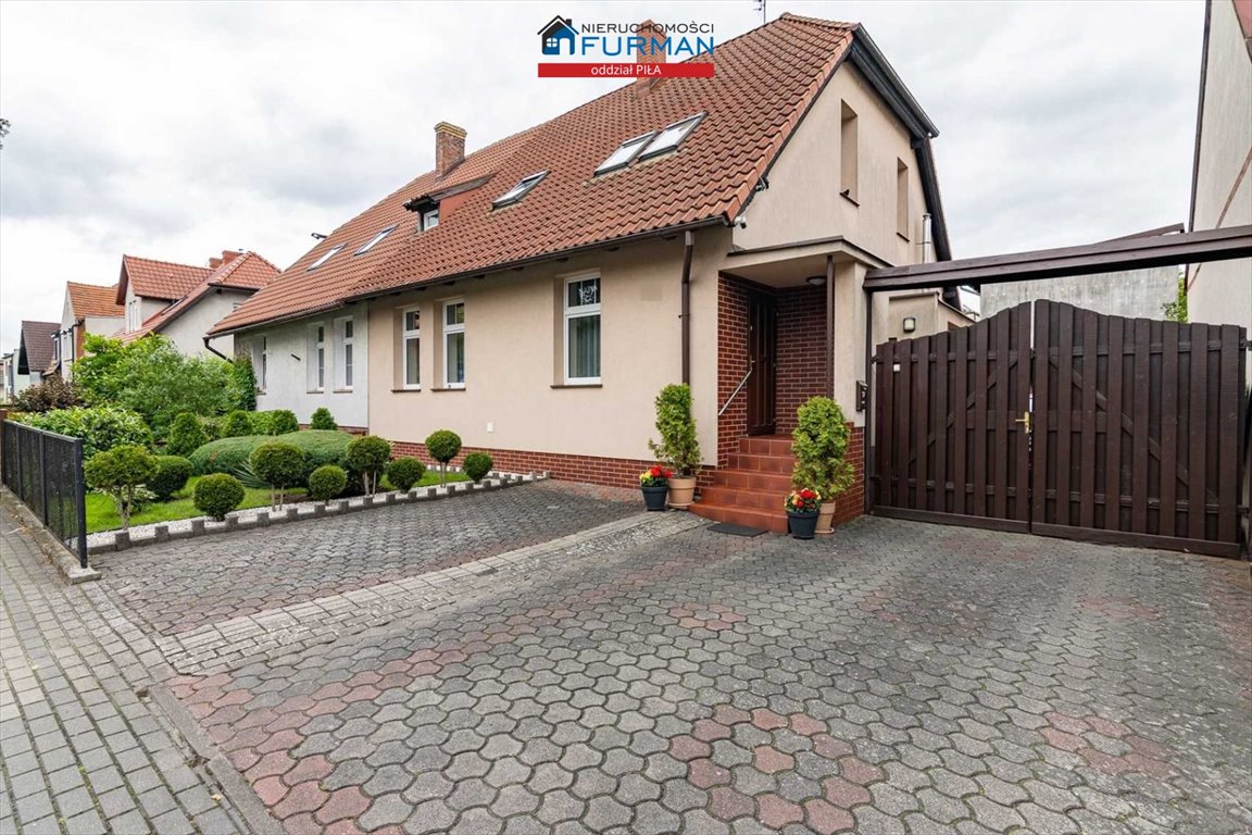 Zapraszam do obejrzenia przestronnego bliźniaka z ogrodem i dwoma poziomami Czarnków  124m2 Foto 1