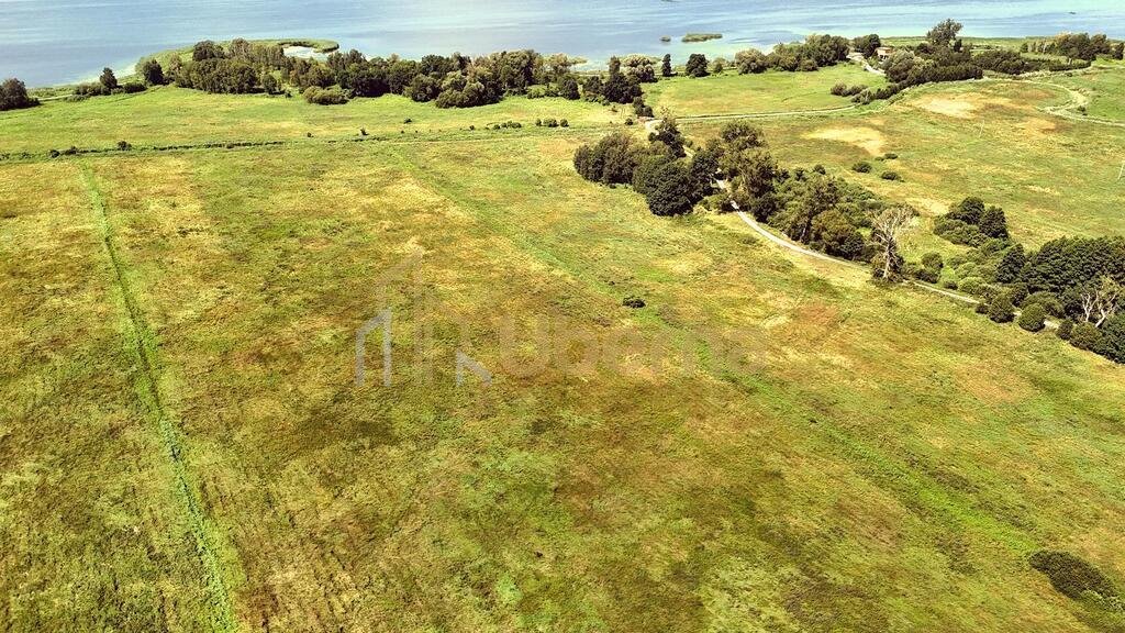 Działka rolna 6,6 ha blisko jeziora, inwestycyjny potencjał Komarowo  65 968m2 Foto 1