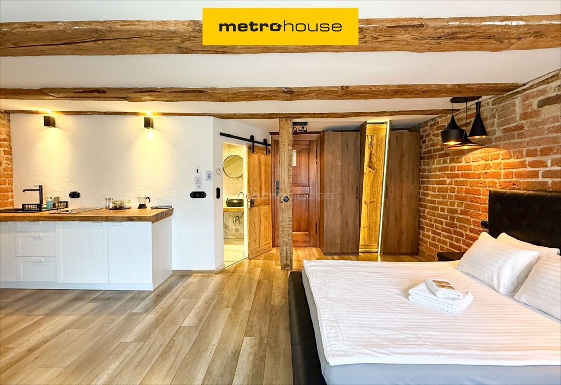 Urokliwy apartament z cegłą i drewnem, blisko Wisły Toruń, Łazienna  36m2 Foto 1