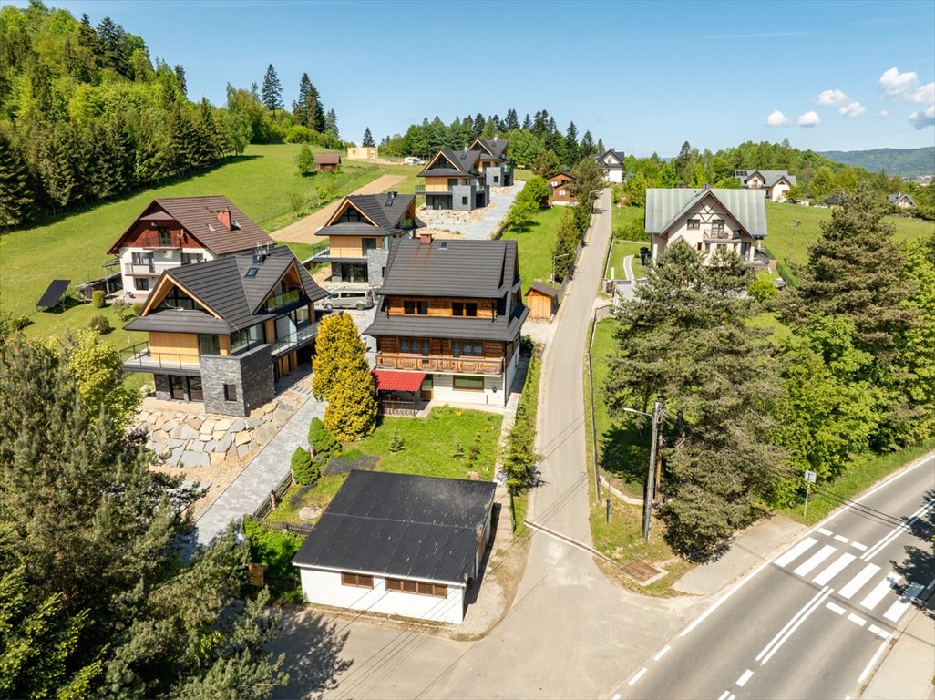Dom z dwoma domkami pod wynajem - widok na jezioro Zamek, Słoneczna  240m2 Foto 1