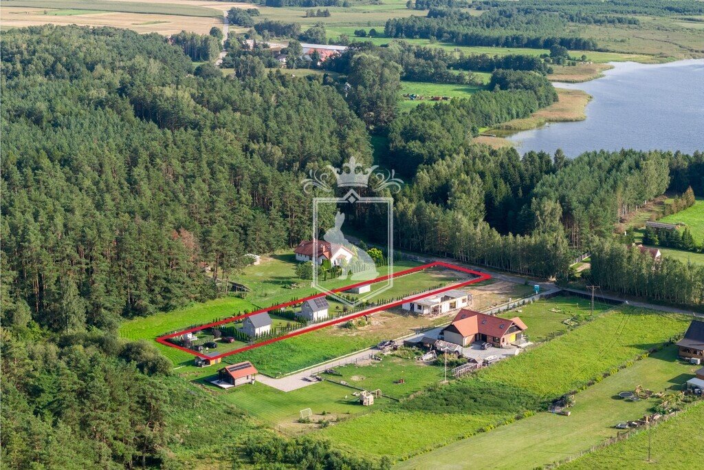 Działka z domkami i infrastrukturą nad jeziorami Mazur Ławki  2 982m2 Foto 1