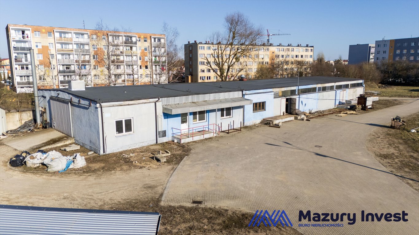 Na wynajem przestronna hala 660 m² z biurami i rampami: Szczytno