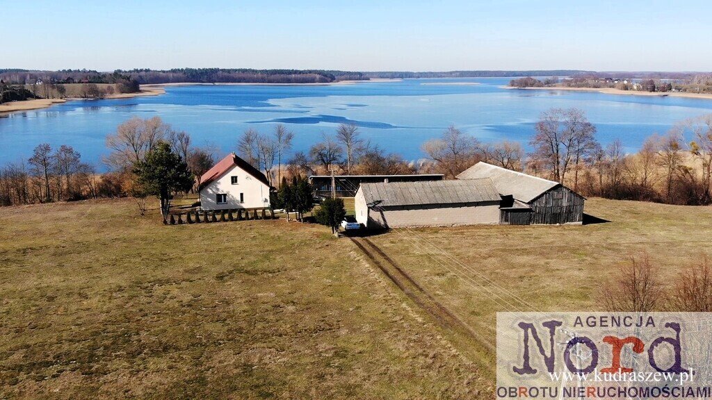 Dom nad jeziorem z 208 m linią brzegową w Rajgrodzie Rajgród, Podliszewo  145m2 Foto 1